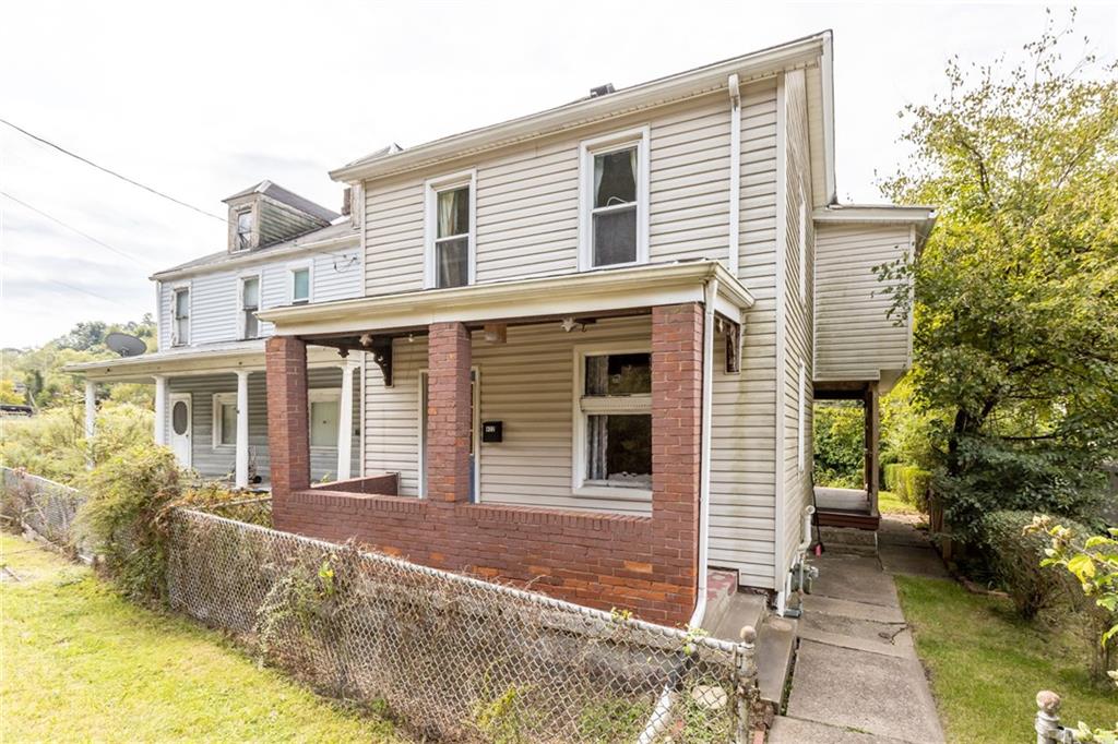 422 Mifflin Road Pittsburgh, PA 15207 - Photo 2 of 18 a front view of a house with a yard