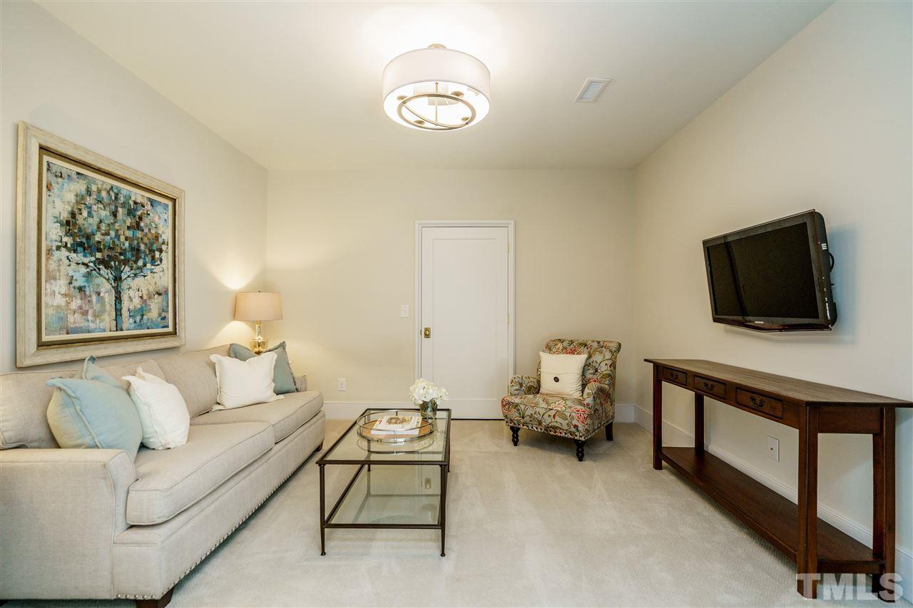 1346 Canterbury Road Raleigh, NC 27608 - Photo 22 of 30 Adjoins the lower level bedroom for the perfect guest suite.