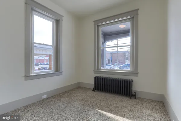 an empty room that has a window