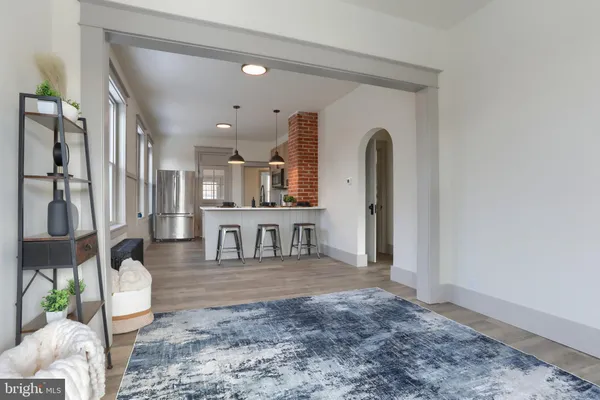 a kitchen with a sink cabinets and window