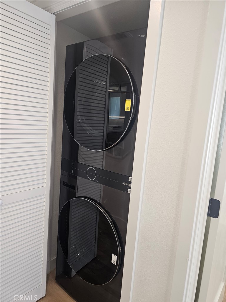 11919 Mayfield Avenue, Unit 2 Los Angeles, CA 90049 - Photo 30 of 75 a close up view of a washer and dryer