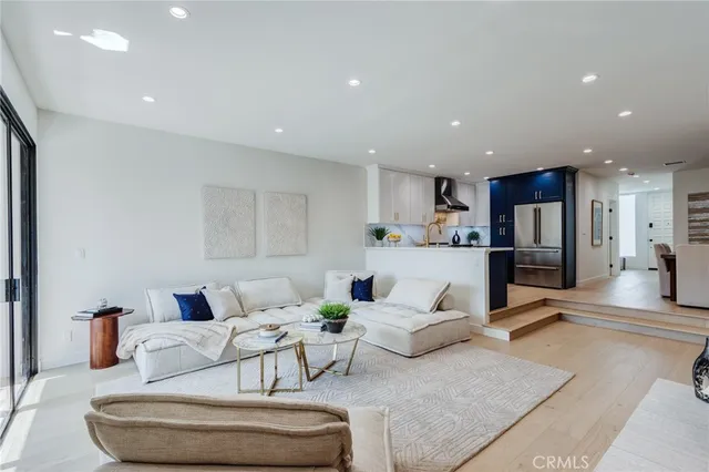 a view of a building with car parked