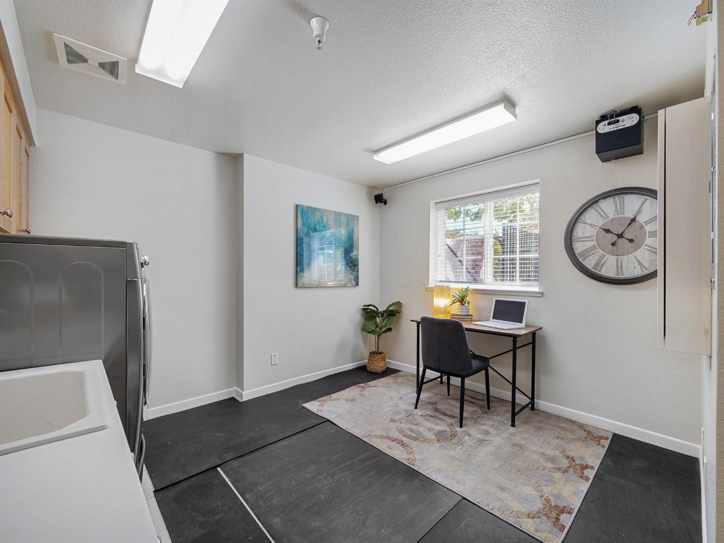 1144 Le Mans Terrace Sunnyvale, CA 94089 - Photo 23 of 29 a view of a livingroom with furniture a couch and mirror
