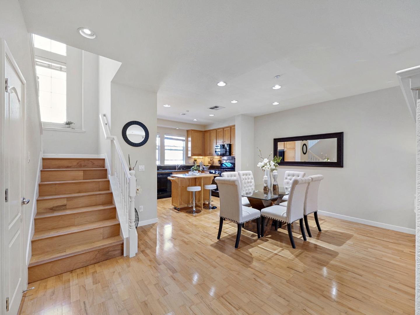 1144 Le Mans Terrace Sunnyvale, CA 94089 - Photo 4 of 29 a living room with furniture and a wooden floor