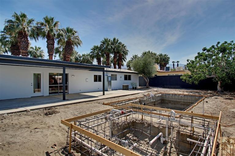 70080 Chappel Road Rancho Mirage, CA 92270 - Photo 23 of 24 a front view of a house with garden