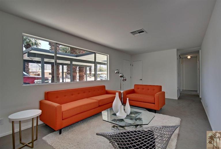 70080 Chappel Road Rancho Mirage, CA 92270 - Photo 9 of 24 a living room with furniture a rug and a window