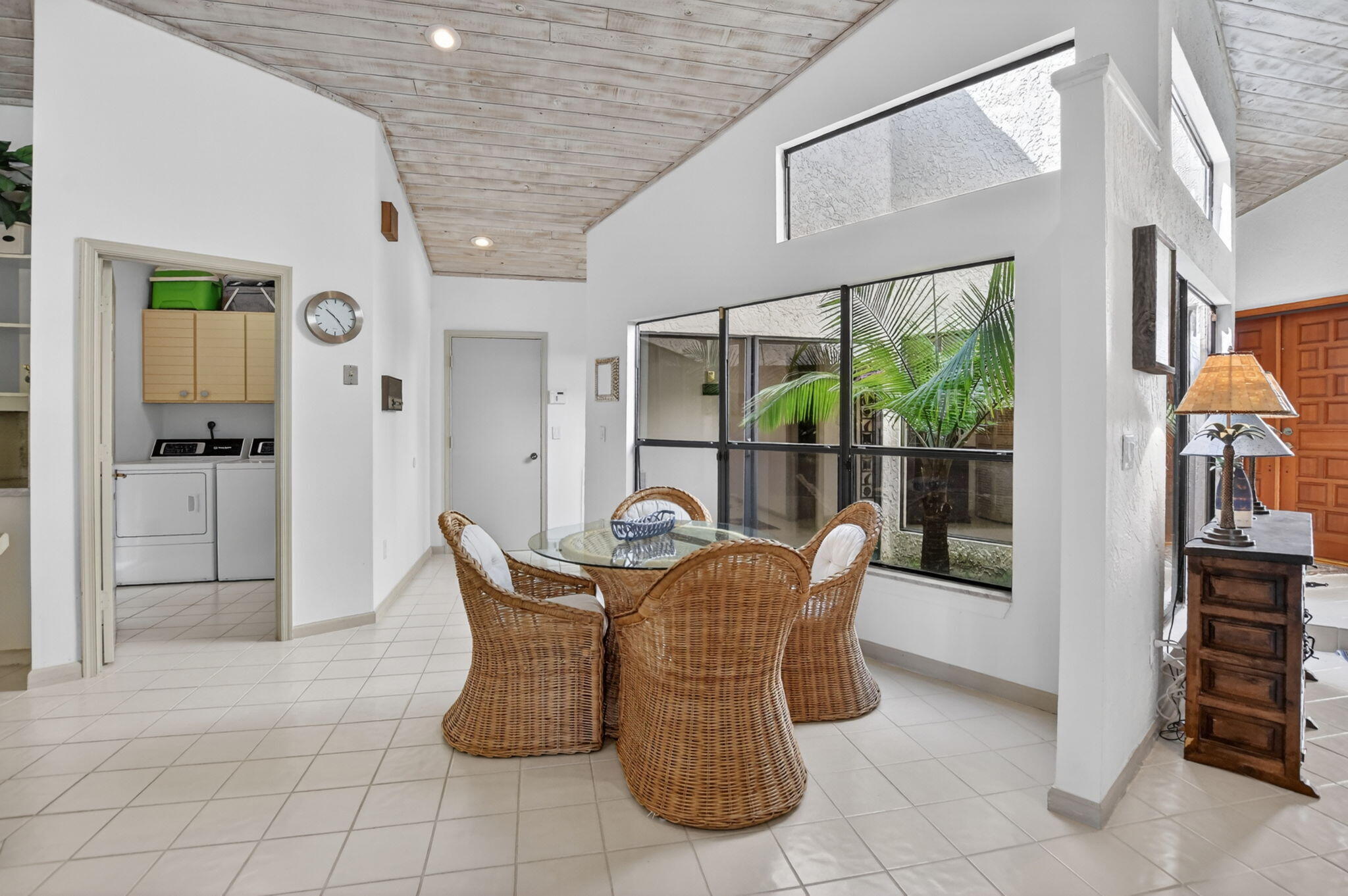 22519 Esplanada Circle, Unit W Boca Raton, FL 33433 - Photo 18 of 57 a dining room with furniture and a floor to ceiling window
