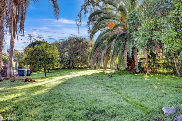 a view of a backyard with a garden