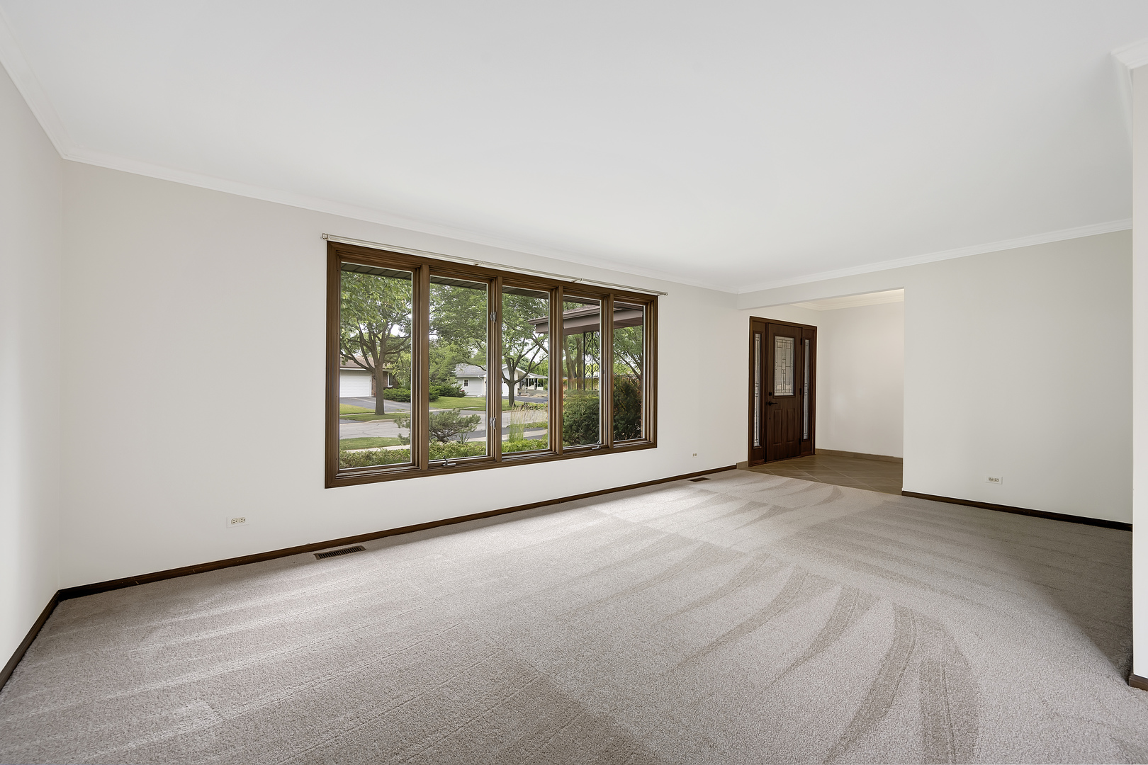 7019 Camden Road Downers Grove, IL 60516 - Photo 11 of 25 a view of an empty room with a window