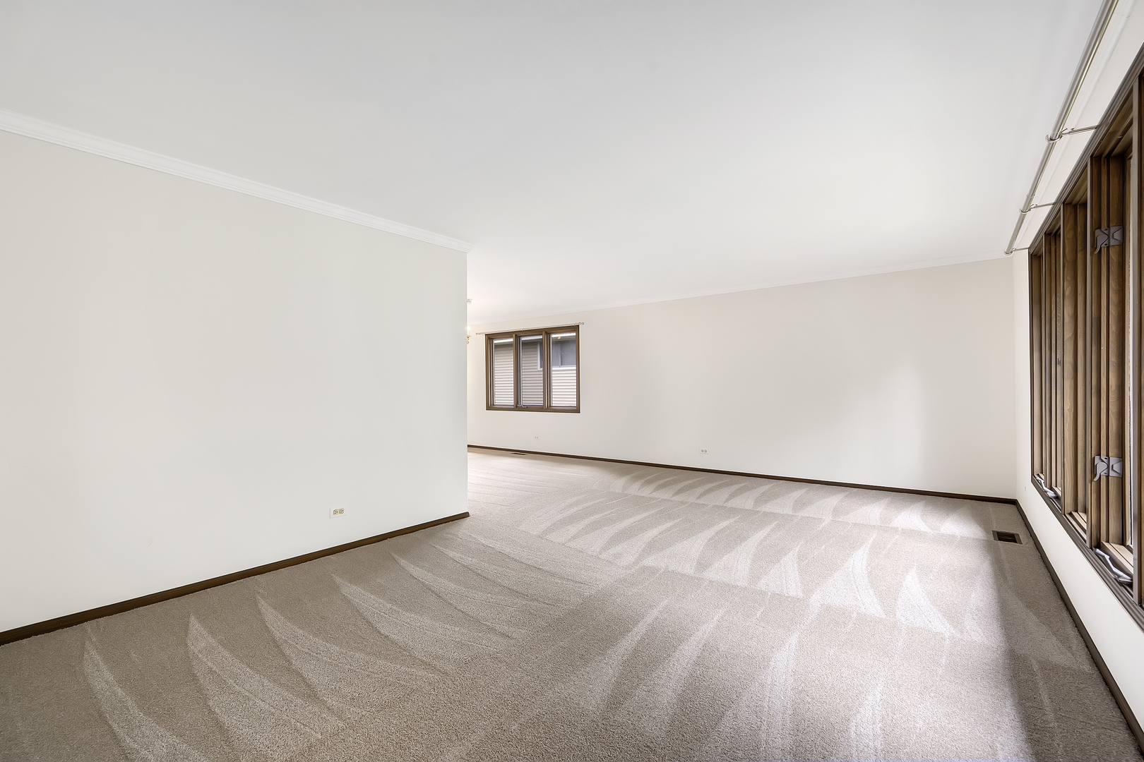 7019 Camden Road Downers Grove, IL 60516 - Photo 12 of 25 an empty room with windows