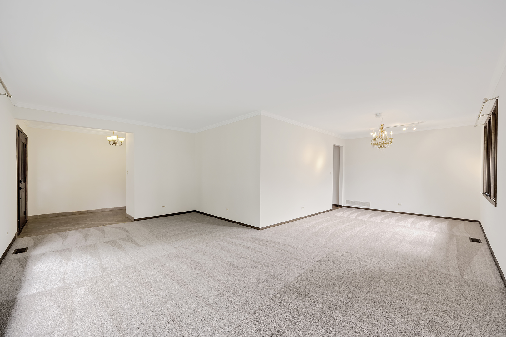 7019 Camden Road Downers Grove, IL 60516 - Photo 13 of 25 an empty room with a ceiling fan and a window
