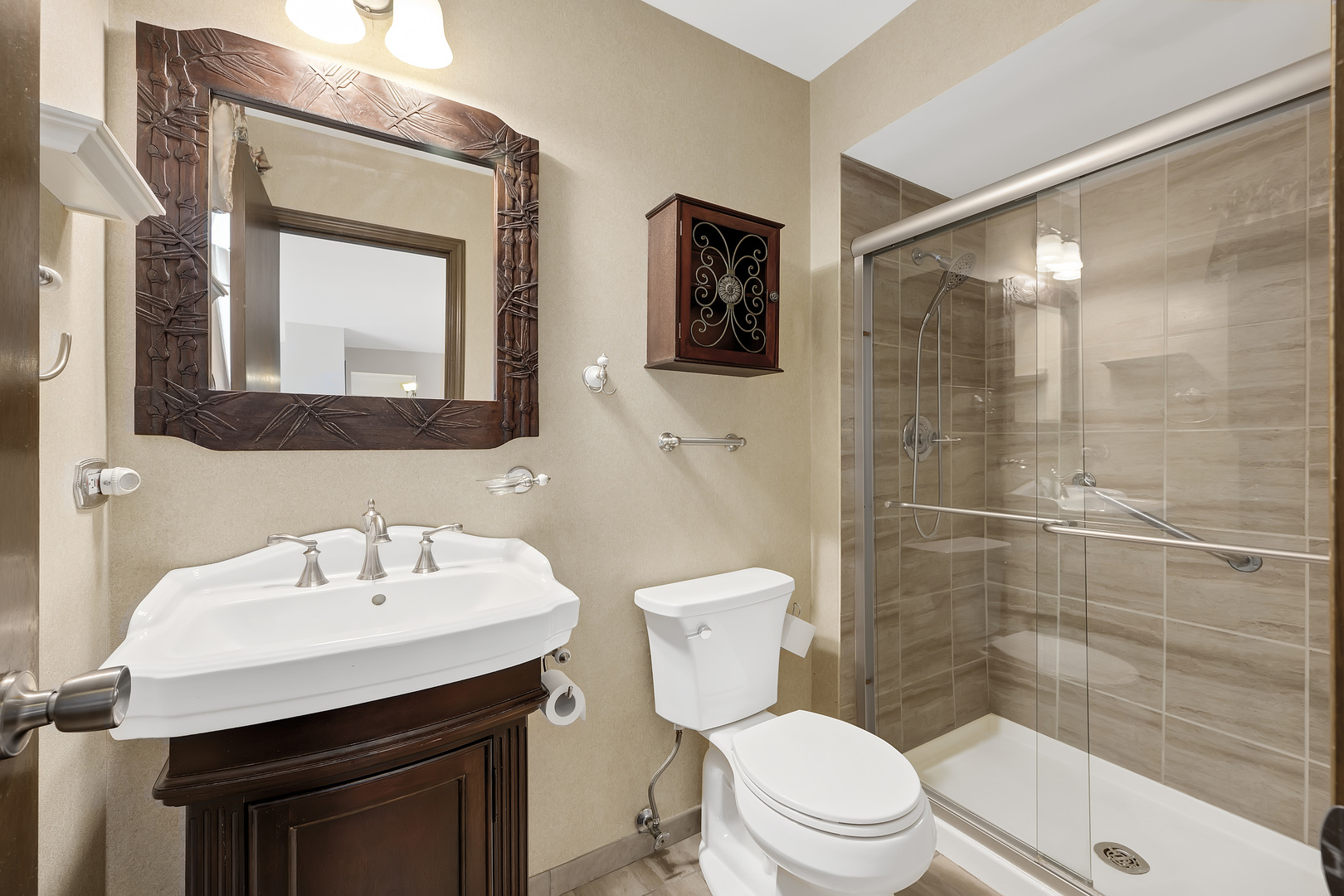 7019 Camden Road Downers Grove, IL 60516 - Photo 15 of 25 a bathroom with a sink a toilet a mirror and shower