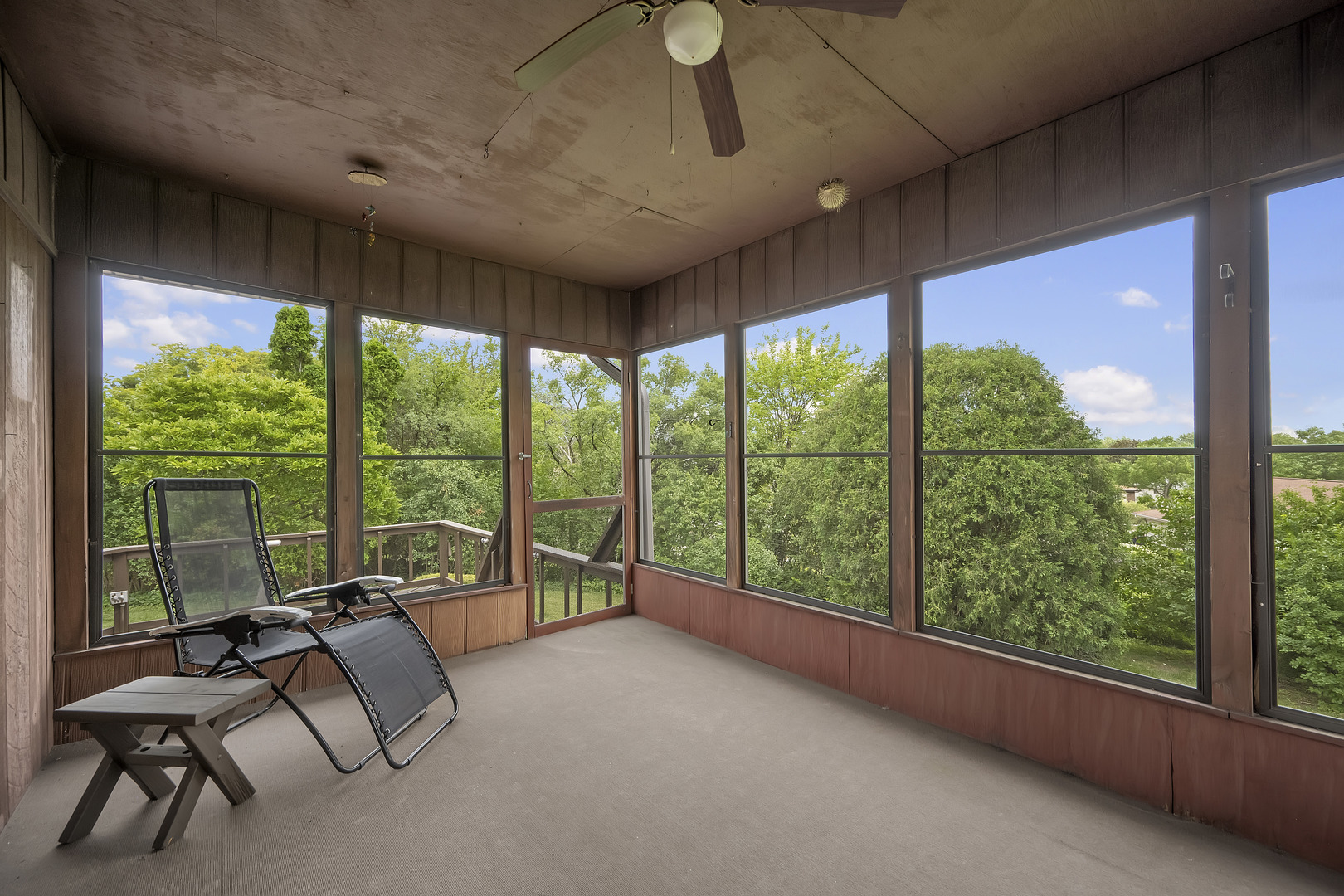 7019 Camden Road Downers Grove, IL 60516 - Photo 22 of 25 a living room with furniture and a large window