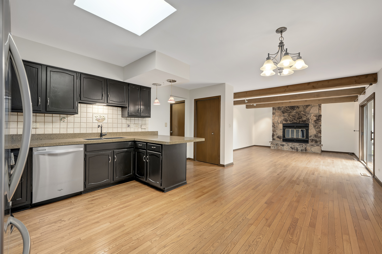 7019 Camden Road Downers Grove, IL 60516 - Photo 6 of 25 a large kitchen with stainless steel appliances granite countertop a stove refrigerator and cabinets