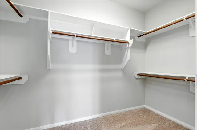 a view of a room with racks on the wall