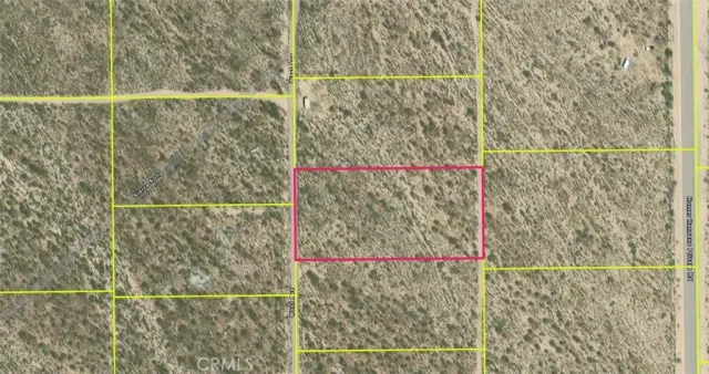 a bathroom with a window and a shower