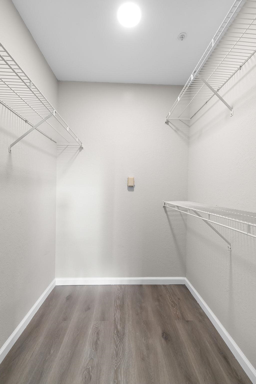 690 Route 23 Wayne Nj 07470, Unit R3 Wayne, NJ 07470 - Photo 13 of 13 a view of a room with racks on the wall