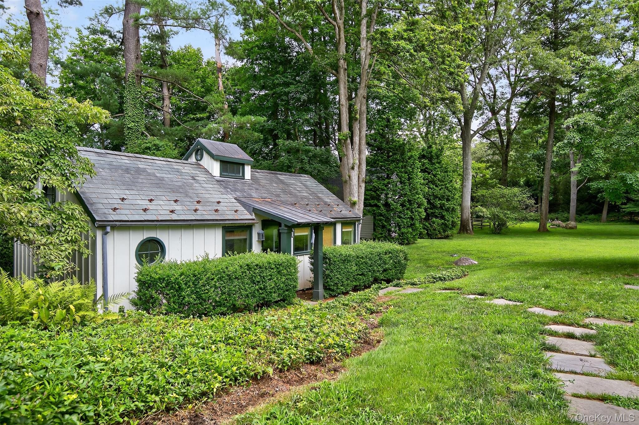 343 Chicken Valley Road Glen Head, NY 11545 - Photo 21 of 49 a house view with a garden space
