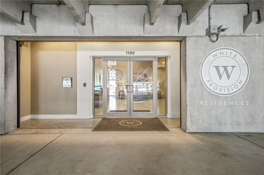 a view of a hallway with entryway