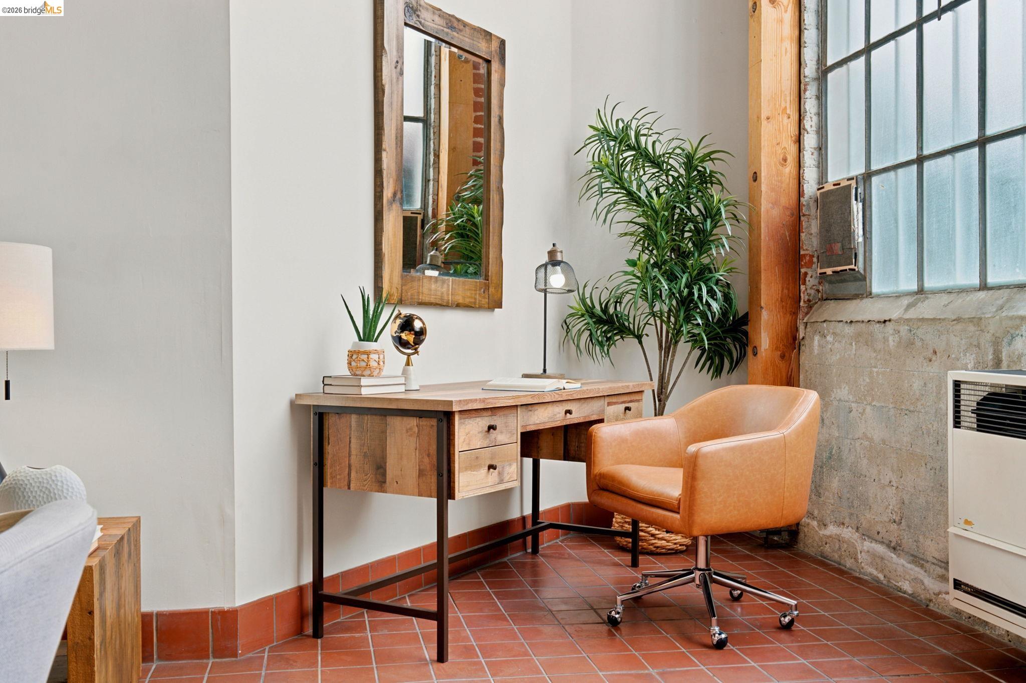 1920 Union Street, Unit 9 Oakland, CA 94607 - Photo 4 of 35 Exposed timber column alongside an industrial-style window with frosted glass panes