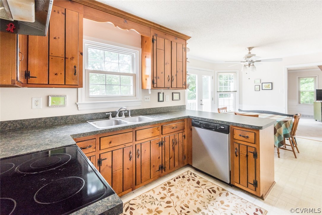 13224 Queensgate Road Midlothian, VA 23114 - Photo 13 of 32 a kitchen with stainless steel appliances granite countertop a sink stove and cabinets
