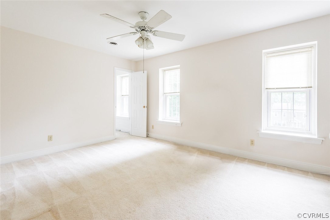 13224 Queensgate Road Midlothian, VA 23114 - Photo 21 of 32 an empty room with windows and fan