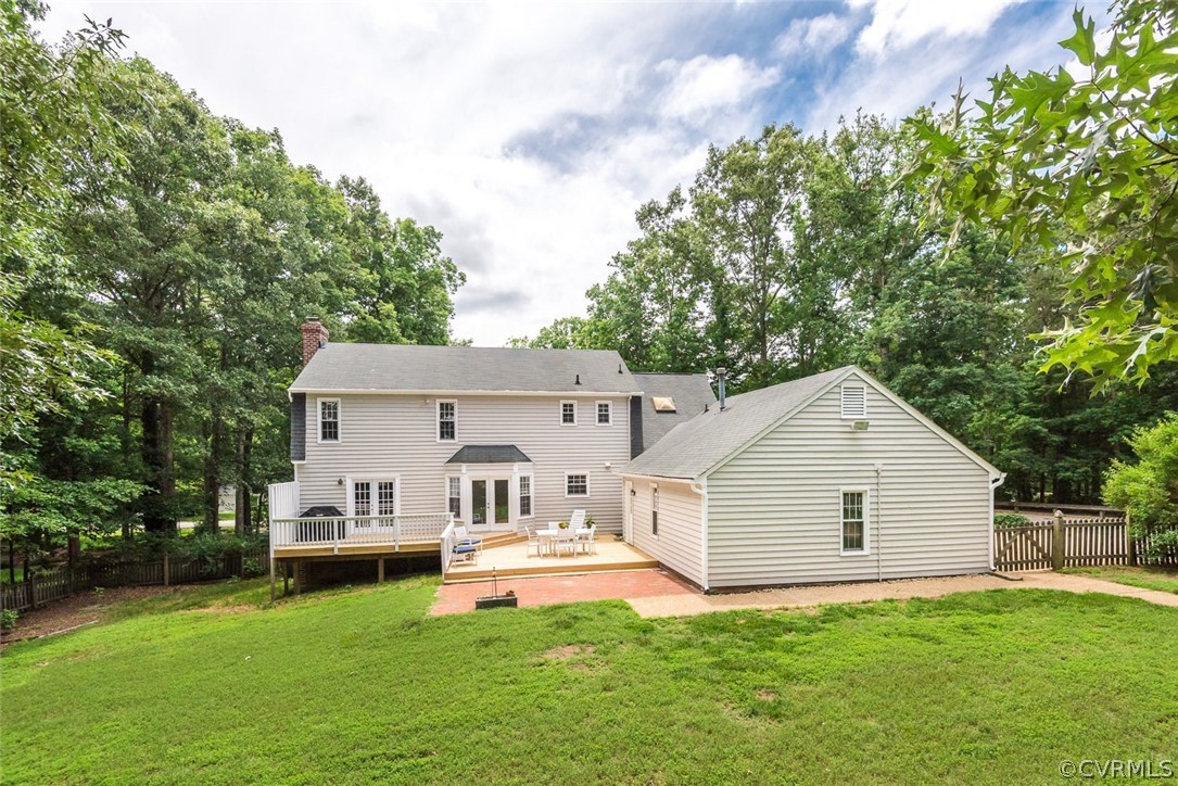 13224 Queensgate Road Midlothian, VA 23114 - Photo 28 of 32 a front view of a house with garden