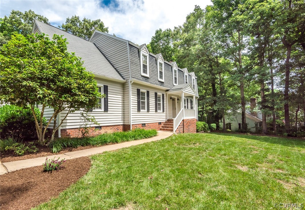 13224 Queensgate Road Midlothian, VA 23114 - Photo 3 of 32 a front view of a house with a yard and trees