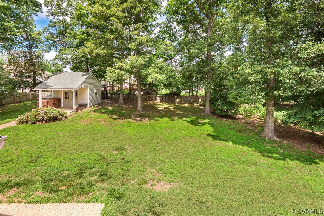 13224 Queensgate Road Midlothian, VA 23114 - Photo 32 of 32 a front view of a house with garden