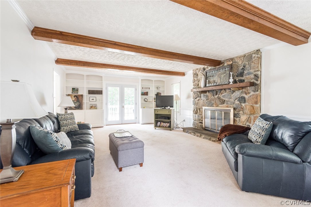 13224 Queensgate Road Midlothian, VA 23114 - Photo 6 of 32 a living room with furniture and a large window
