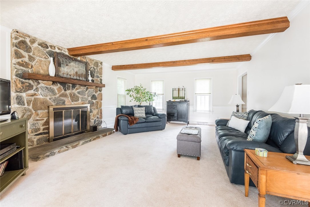13224 Queensgate Road Midlothian, VA 23114 - Photo 7 of 32 a living room with furniture and a fireplace