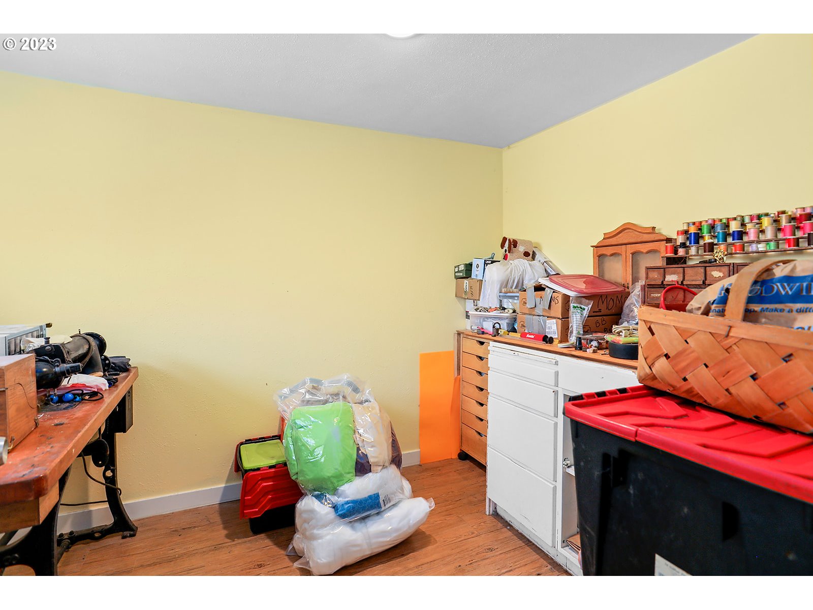 695 Main Street Dufur, OR 97021 - Photo 27 of 42 a living room with furniture and a wooden floor