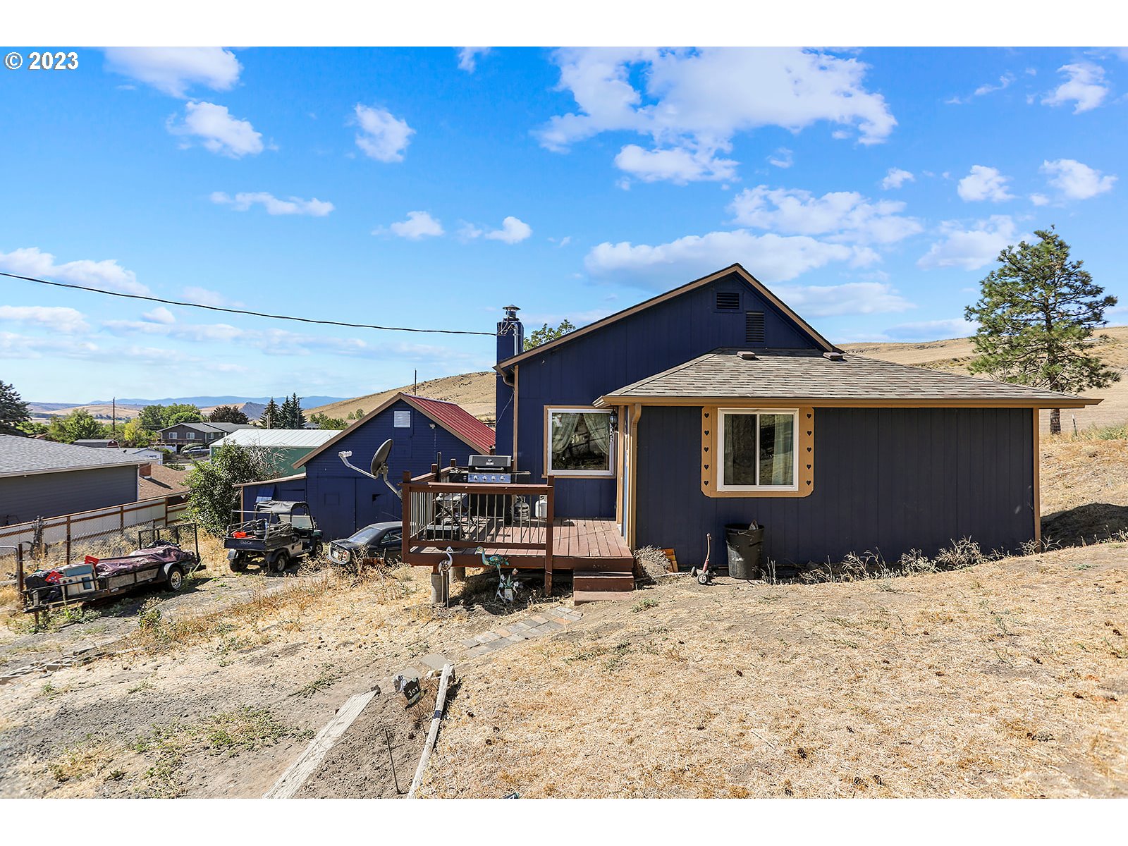695 Main Street Dufur, OR 97021 - Photo 42 of 42 a front view of a house with a yard