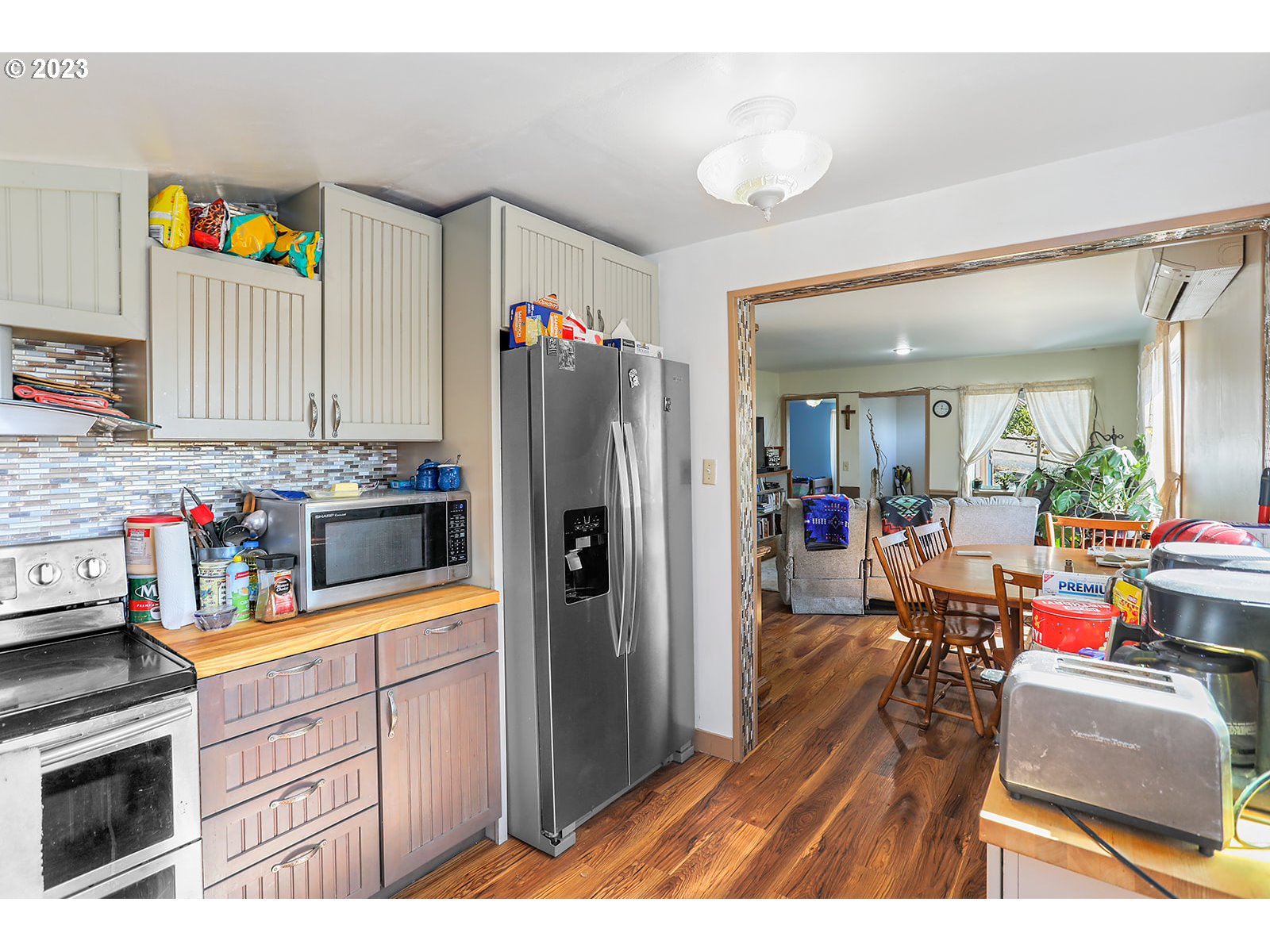 695 Main Street Dufur, OR 97021 - Photo 7 of 42 a kitchen view with appliances and cabinets