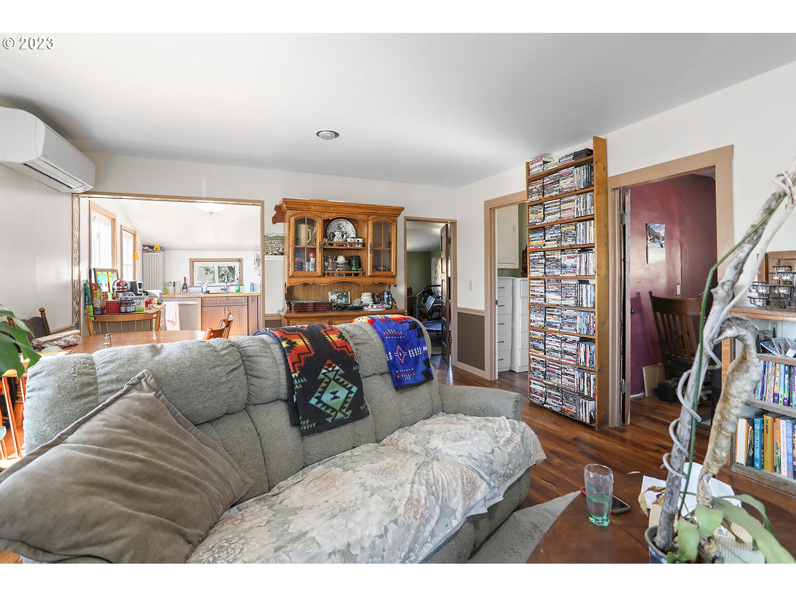 695 Main Street Dufur, OR 97021 - Photo 10 of 42 a bedroom with furniture and a book shelf