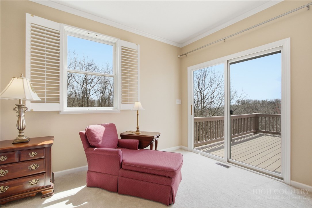 880 Algonquin Drive Boone, NC 28607 - Photo 37 of 50 a room with furniture and windows