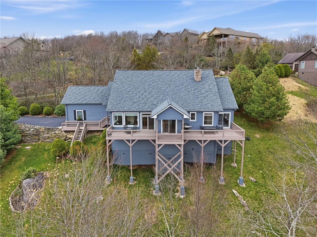 880 Algonquin Drive Boone, NC 28607 - Photo 4 of 50 a aerial view of a house with a yard table and chairs