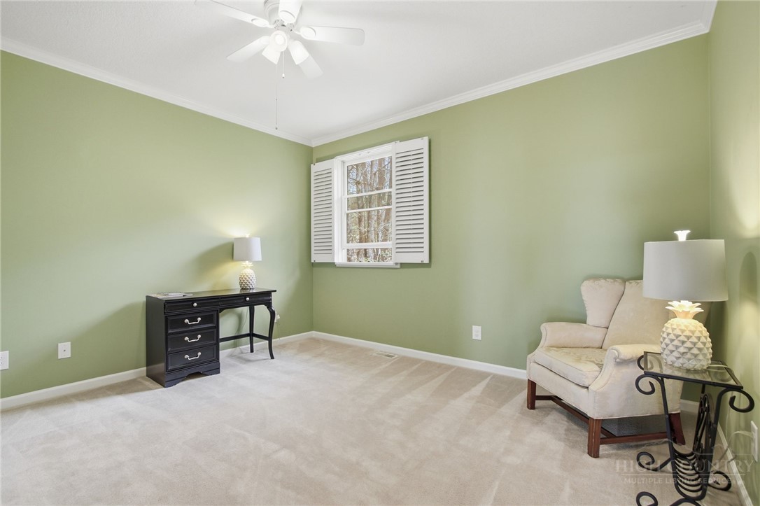 880 Algonquin Drive Boone, NC 28607 - Photo 41 of 50 a bedroom with a bed and a window