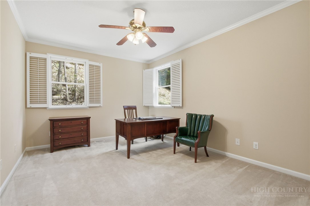 880 Algonquin Drive Boone, NC 28607 - Photo 47 of 50 a bedroom with furniture and a window