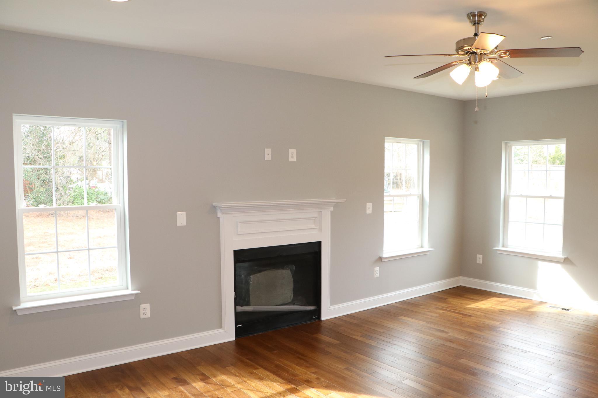 8008 Quarterfield Road Severn, MD 21144 - Photo 12 of 32 GREAT ROOM ,GAS FIRE PLACE , RECESS LIGHTING