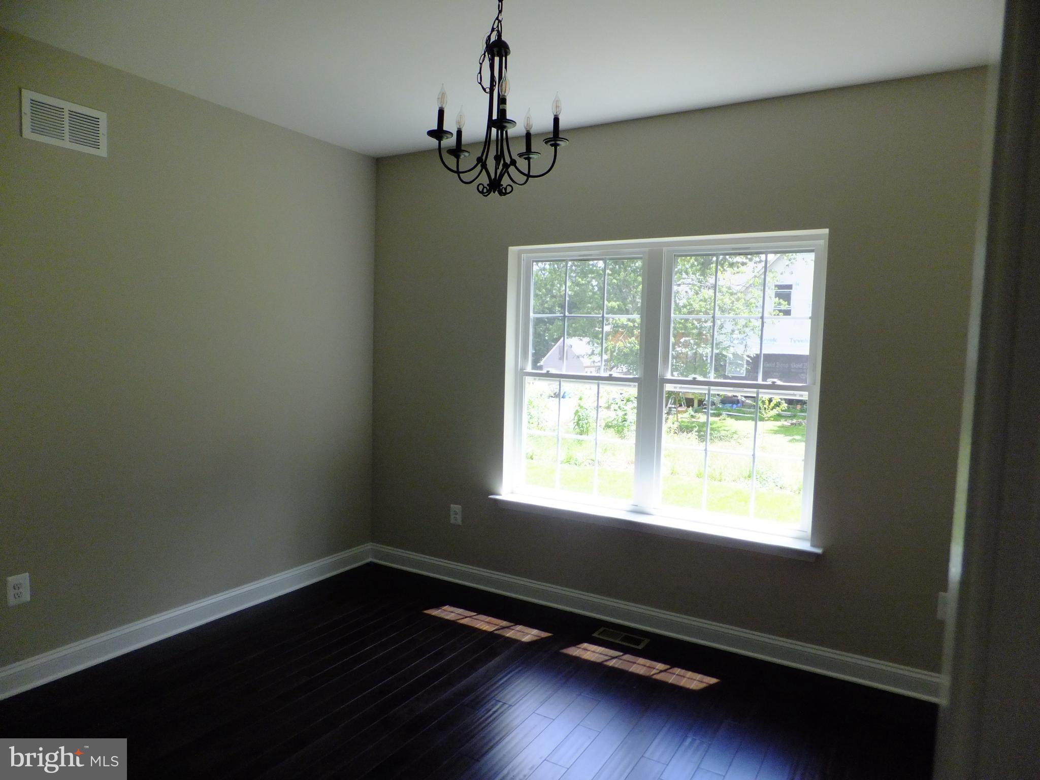8008 Quarterfield Road Severn, MD 21144 - Photo 6 of 32 LIVING ROOM HARDWOOD FLOOR