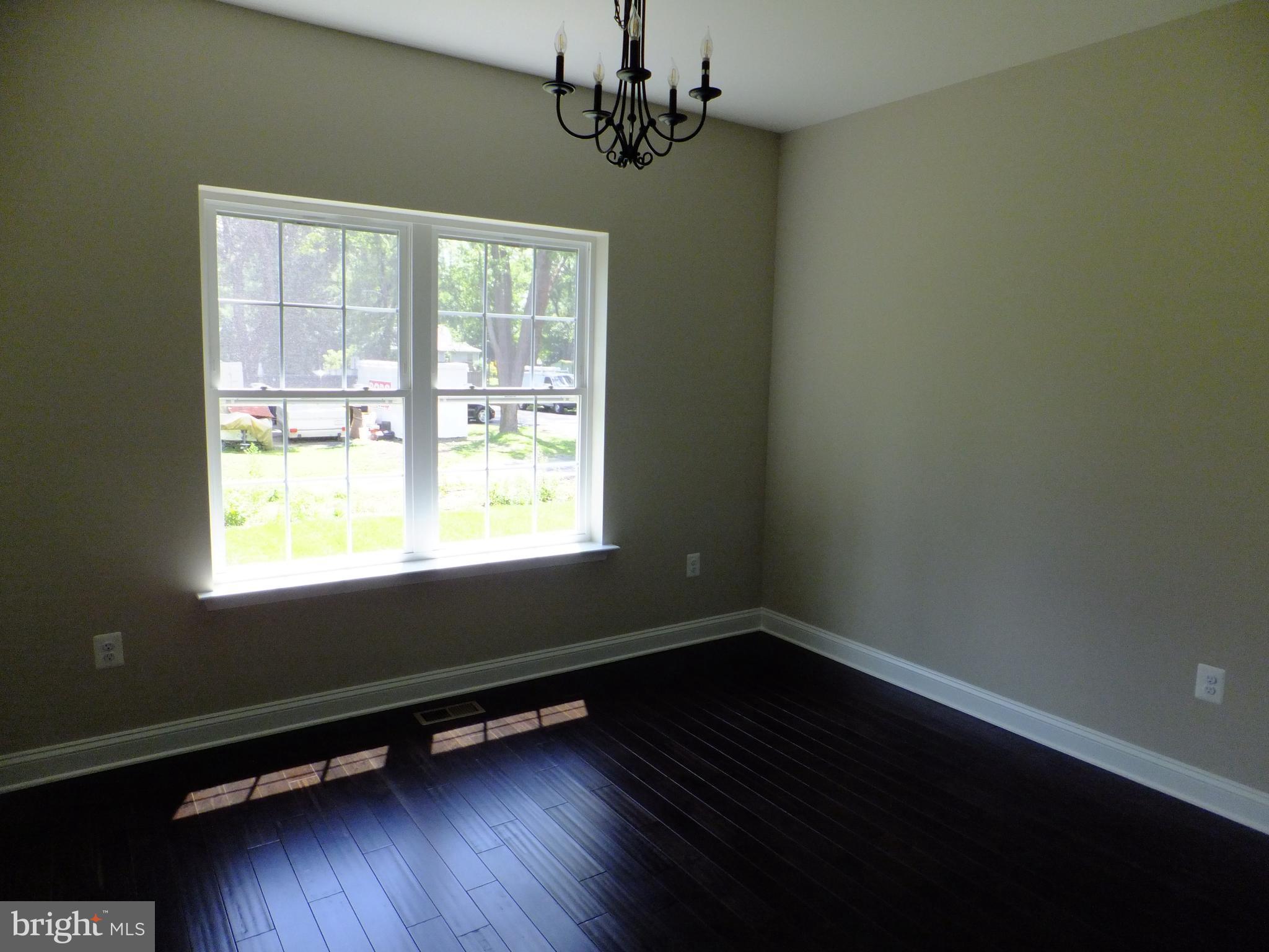 8008 Quarterfield Road Severn, MD 21144 - Photo 7 of 32 LIVING ROOM W/ PLENTY NATURAL LIGHT