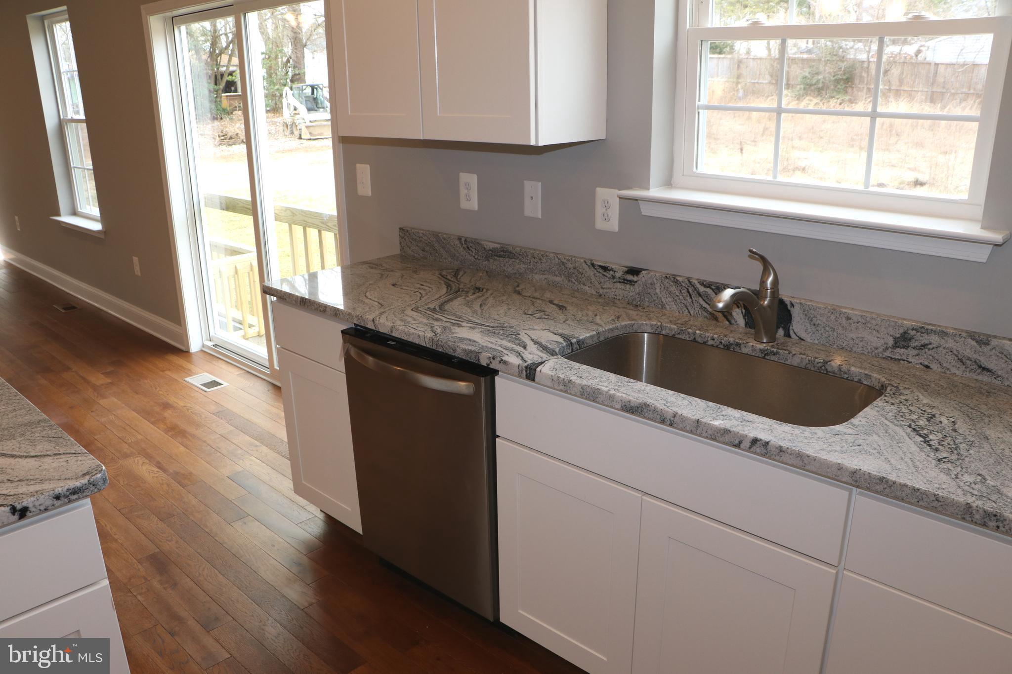 8008 Quarterfield Road Severn, MD 21144 - Photo 10 of 32 KITCHEN WITH GRANITE COUNTERTOPS