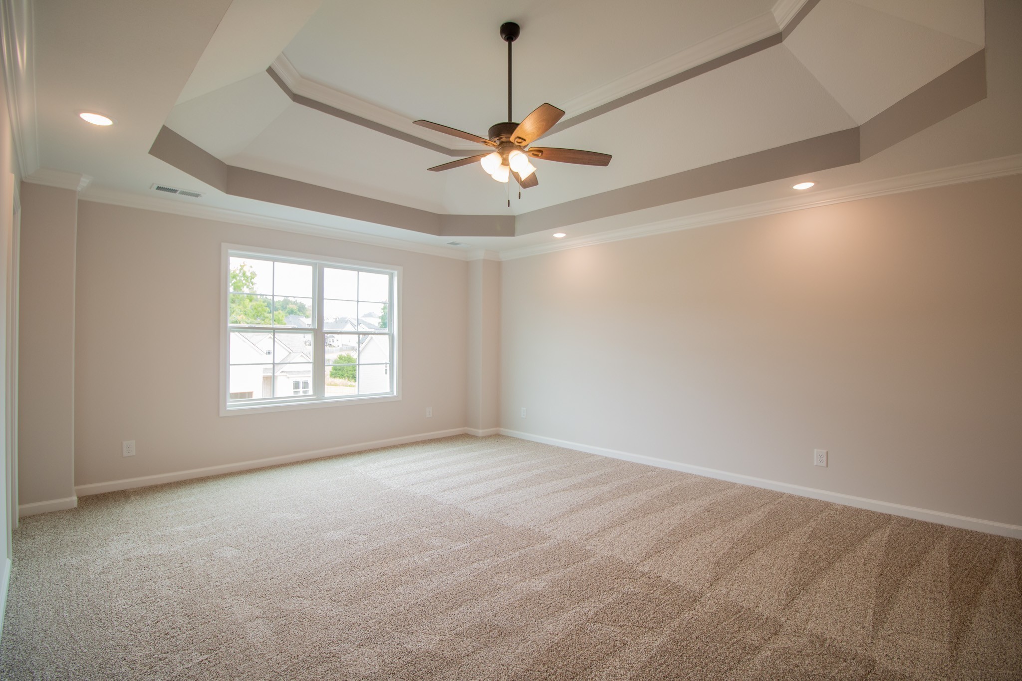 288 Timber Springs Clarksville, TN 37042 - Photo 12 of 25 a view of a livingroom with a ceiling fan and window