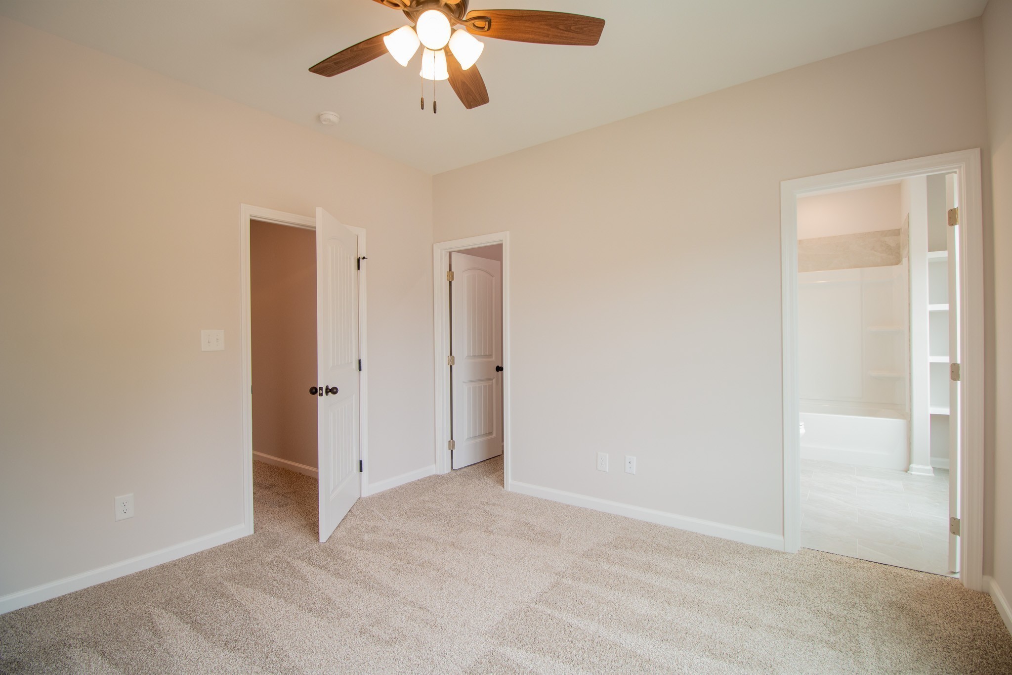 288 Timber Springs Clarksville, TN 37042 - Photo 22 of 25 an empty room with a chandelier fan and closet area