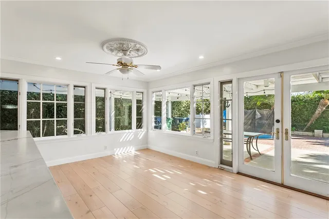 a view of an empty room with a balcony