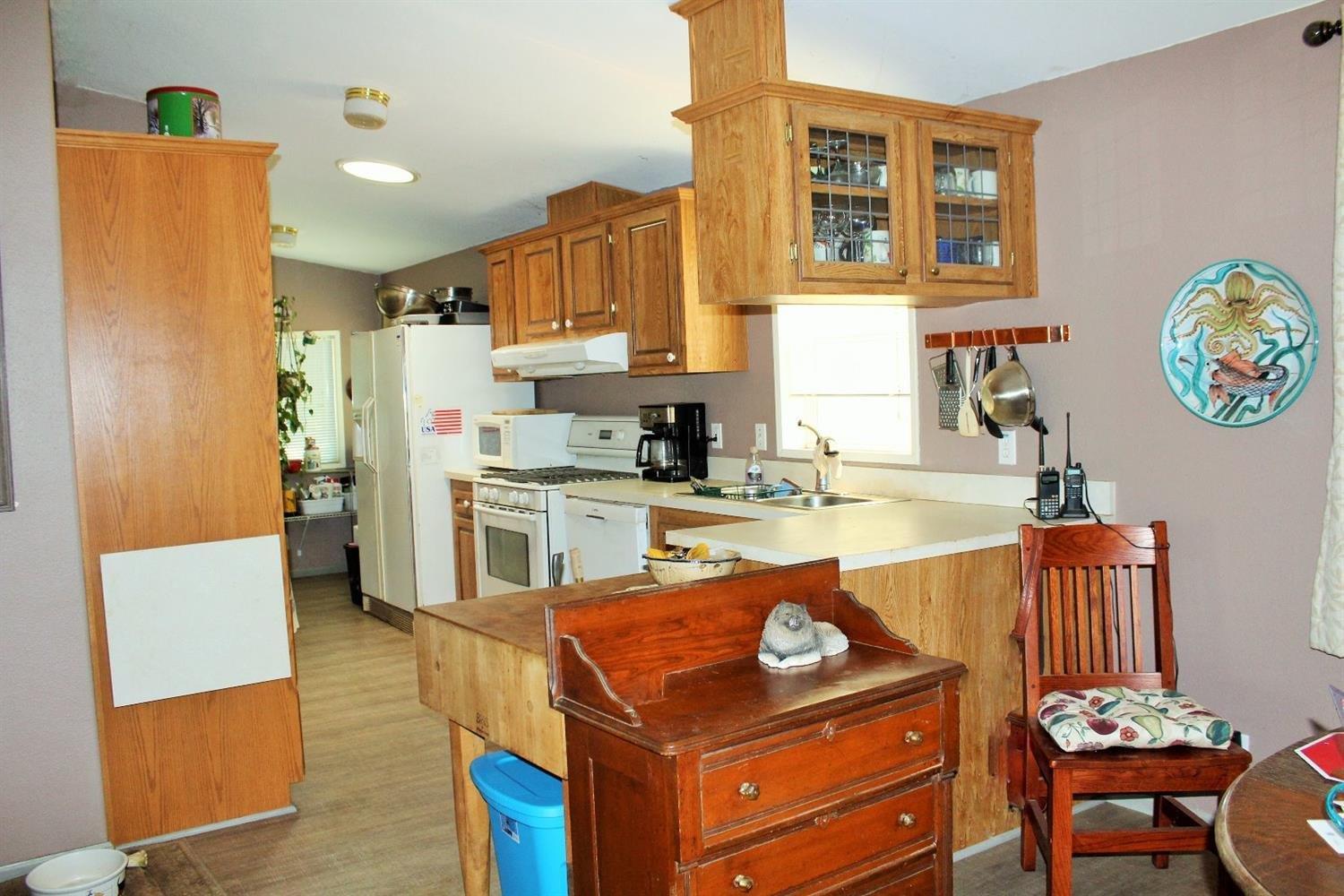 3615 Dick George Road Cave Junction, OR 97523 - Photo 5 of 24 Kitchen features a large custom pantry w