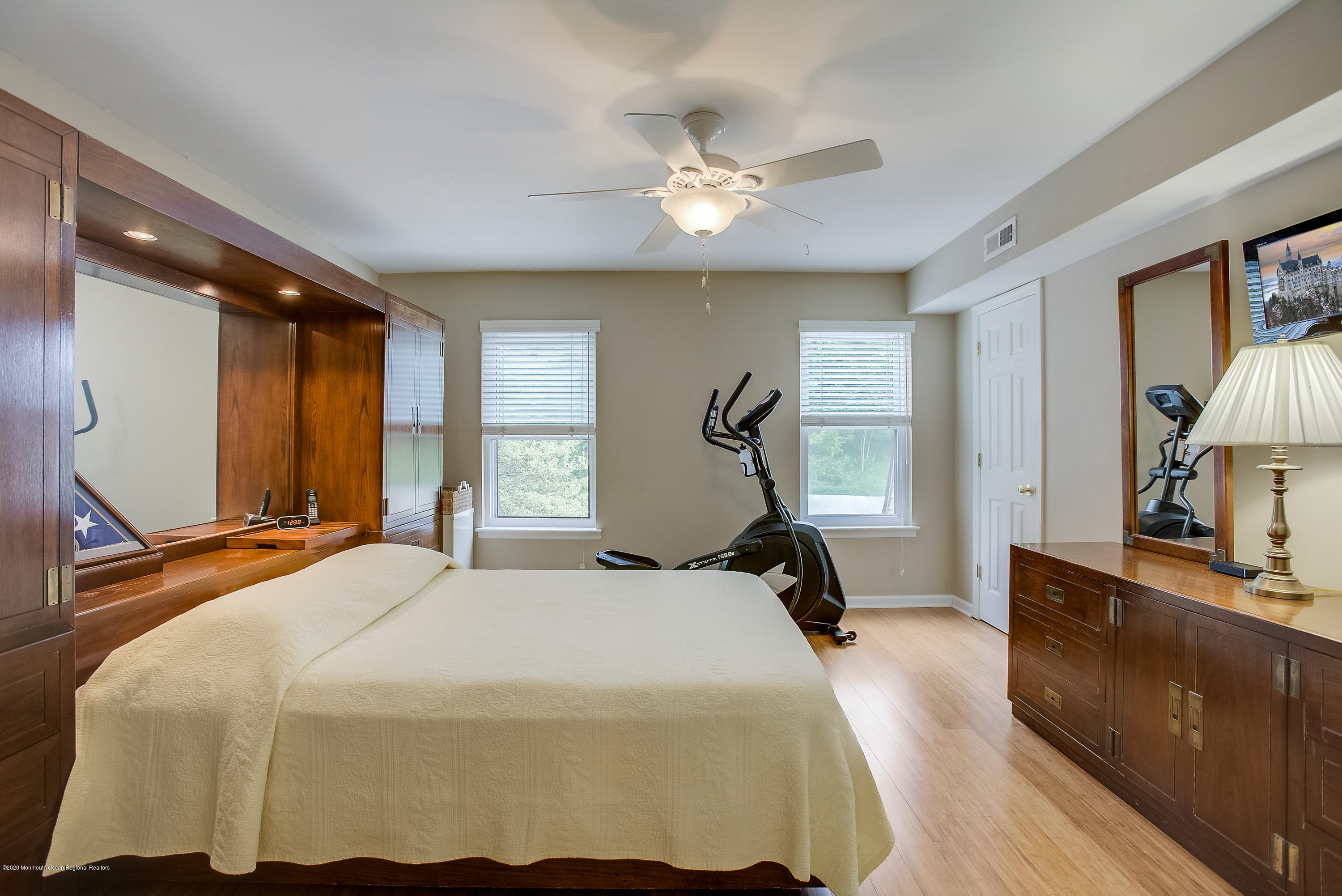 200 Portland Road, Unit E6 Highlands, NJ 07732 - Photo 15 of 30 a bedroom with a bed and a flat tv screen on dresser