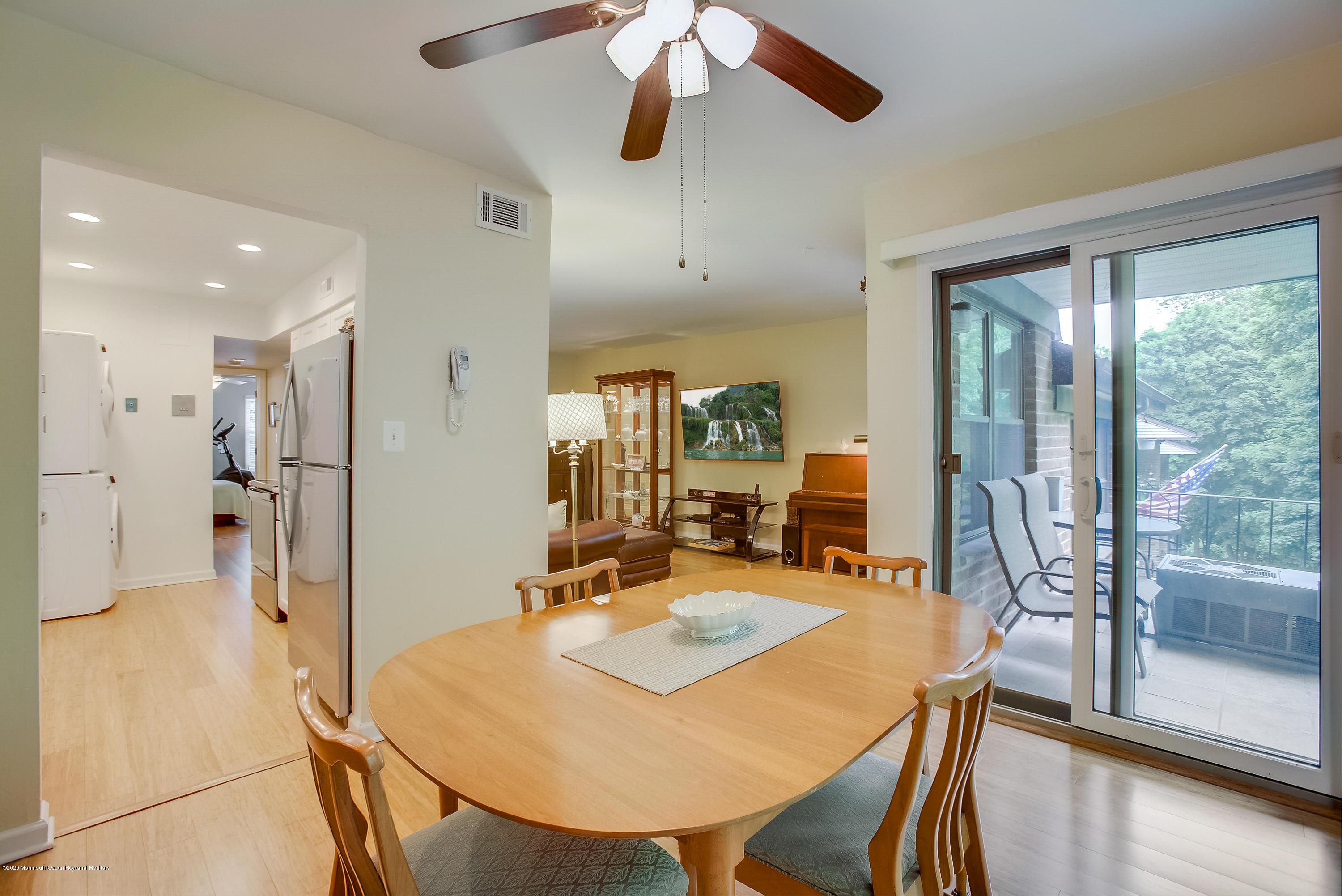 200 Portland Road, Unit E6 Highlands, NJ 07732 - Photo 8 of 30 a view of a dining room with furniture window and wooden floor