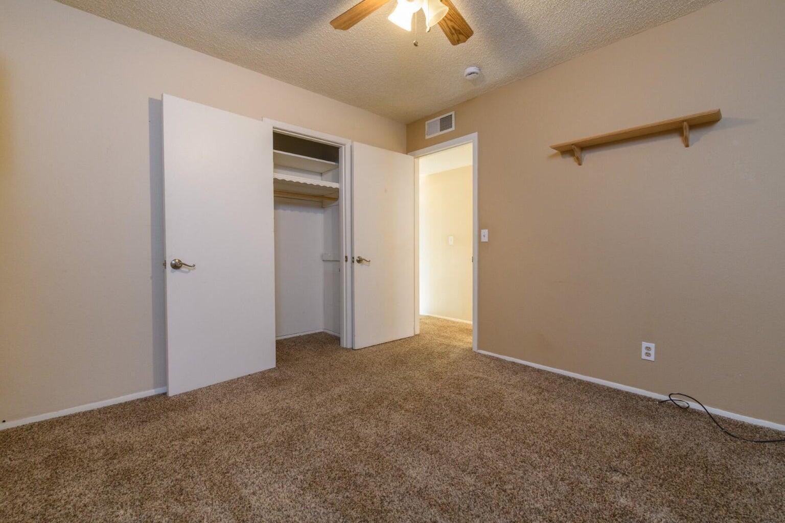 6781 Reflection Street Redding, CA 96001 - Photo 11 of 13 a view of an empty room with a window